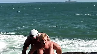 BBC Fucks girl in ass on the rocks by Ocean!